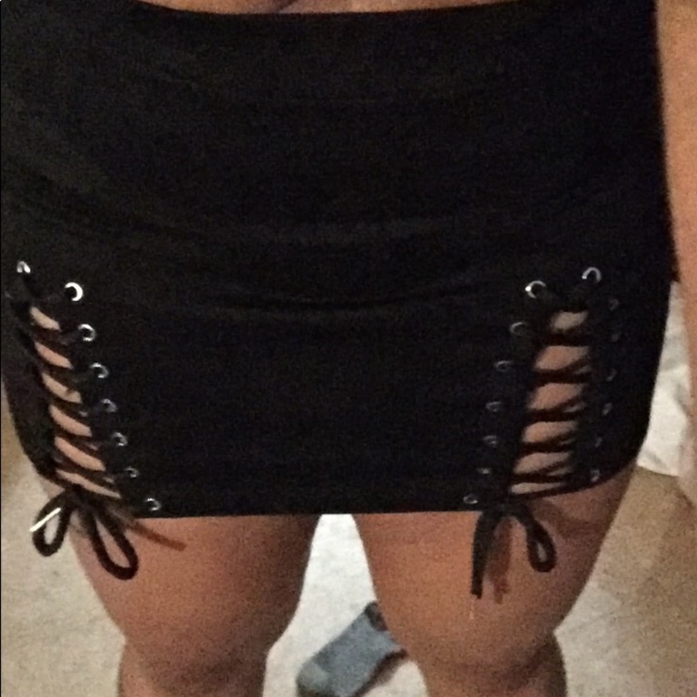 Brand new, never worn lace up mini skirt